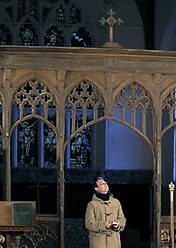 Ben looks up at the screen