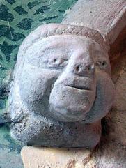 one of the rather porcine monks 