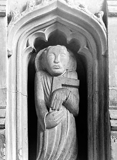 the modern statues in the reredos